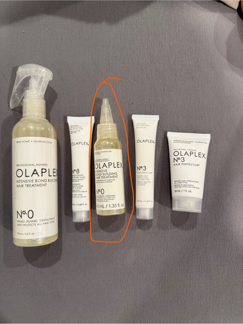 OLAPLEX No.0 Intensive Bond Building Treatment - 

Bottle circled in Orange